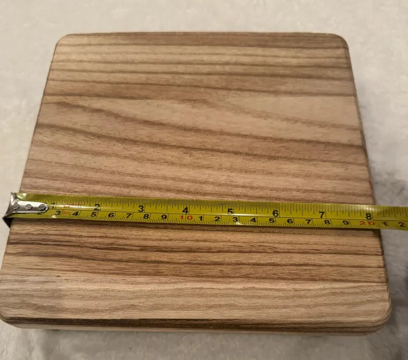 Wooden decorative shelf with black feet