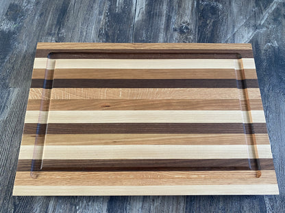 Board 07.44 Handcrafted Edge Grain Cutting Board with Juice Groove – Oak, Cherry & Walnut – 11” x 17”
